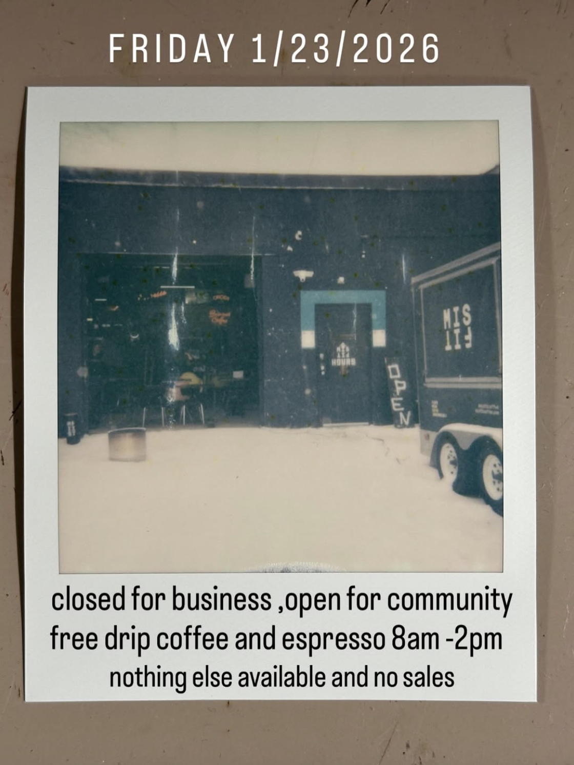 A recreation of a Polaroid photo featuring the open garage door of a coffee shop and a flyer promoting a day the business will be closed for coffee but open for community in support of a general economic strike to oppose immigration action by federal officers of ICE.